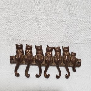 Cast iron metal wall rack with 7 hooks